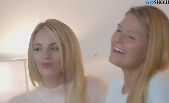 Blonde Seductress Strips for Passionate Encounter